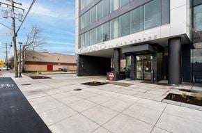 Surrey apartment for rent - A street view of a building with the name "Grand George" on it.