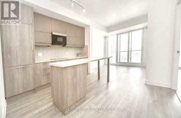 Markham (Unionville) condo for rent - A kitchen with a countertop and cabinets is shown in this image.