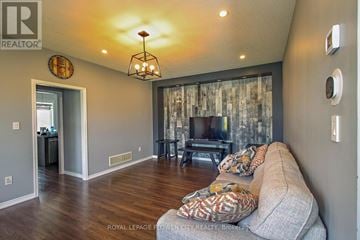 Brampton (Northwest Brampton) apartment for rent - A living room with a couch and a television.