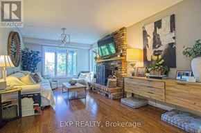 Grimsby (Grimsby West) apartment for rent - A living room with a fireplace and a couch.