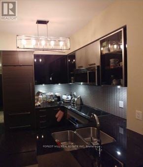 Toronto (Willowdale West) condo for rent - A kitchen with a sink and a counter.