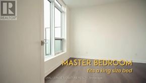 Toronto (Mount Pleasant West) condo for rent - A spacious room with wooden floors and large windows.