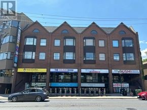 Toronto (Lambton Baby Point) multi-family for rent - A building with a sign that says "The Colour Room" on it.