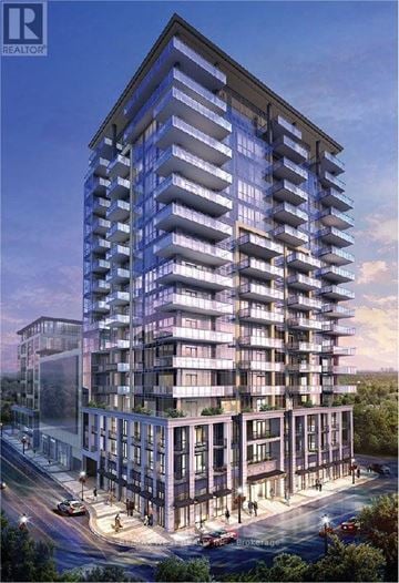 Burlington (Brant) condo for rent - A modern multi-story residential building with balconies and a clear sky in the background.