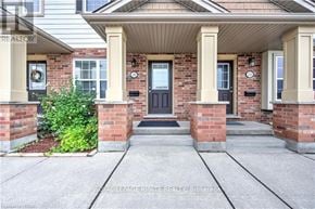 London South (South U) townhouse for rent - A house with a front porch and a black door.