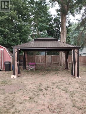 London East (East M) apartment for rent - A gazebo is in the middle of a grassy area.