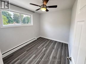 London East (East I) apartment for rent - A room with a ceiling fan and a window.