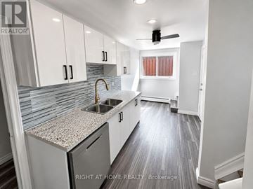 London East (East I) apartment for rent - A kitchen with a sink and a window.