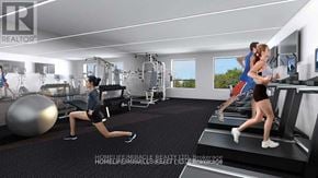 Brantford condo for rent - A woman is exercising on a treadmill in a gym.