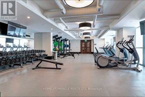 Toronto (Niagara) condo for rent - A gym with a variety of equipment including treadmills, weights, and exercise machines.
