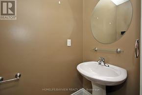 Markham (Cornell) apartment for rent - A bathroom with a sink, mirror and towel rack.