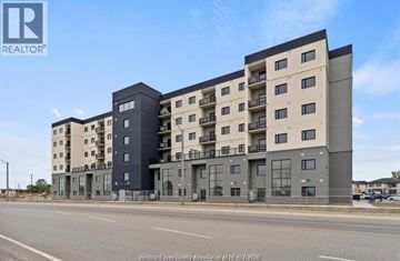 Lasalle condo for rent - A large, modern apartment building with balconies on the upper floors.