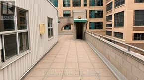 Toronto (Church-Yonge Corridor) condo for rent - A long, narrow balcony with a Forest Hill Real Estate Inc. sign on the wall.