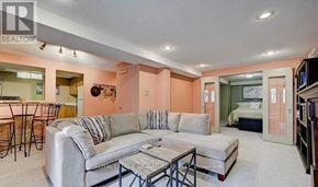 Pickering (Amberlea) apartment for rent - A living room with a grey couch and a coffee table.