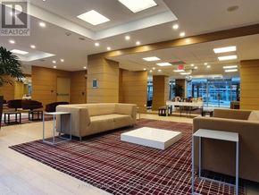 Toronto (Waterfront Communities) condo for rent - A spacious waiting area with a red and white checkered floor.