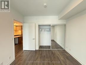 Vaughan (Beverley Glen) condo for rent - A room with a white door and a white wall.