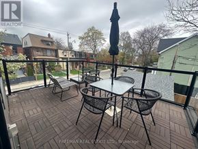 Toronto (University) apartment for rent - A patio with a table and chairs is shown.