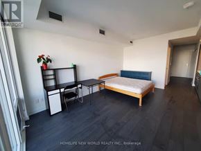 Toronto (Church-Yonge Corridor) condo for rent - A bedroom with a bed, desk, and chair.