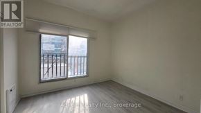 Toronto (Roncesvalles) apartment for rent - A room with a window and a sign that says Advent Realty Inc., Brokerage.