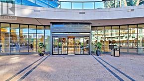 Toronto (Waterfront Communities) condo for rent - The image shows the front of a real estate office with the sign "MASTER & TRUST REALTY INC."