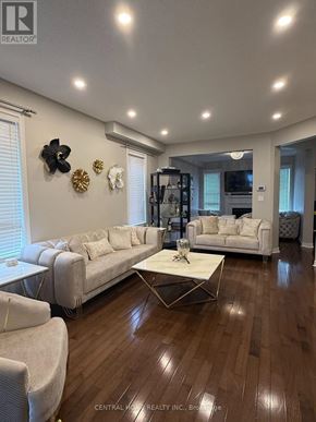 Richmond Hill (Westbrook) apartment for rent - A living room with a white couch and a coffee table.