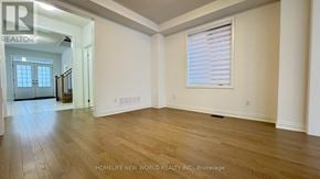 East Gwillimbury (Holland Landing) apartment for rent - A room with wooden flooring and a window with blinds.