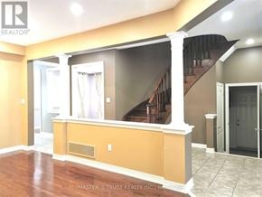 Aurora apartment for rent - A room with a staircase and a window.