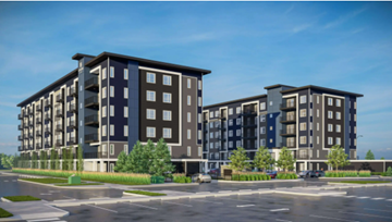 Calgary apartment for rent - A modern apartment building with a parking lot in front.