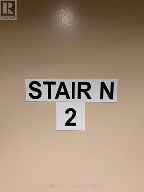 Toronto (Bayview Village) condo for rent - A sign on a wall that says "STAIR N 2".
