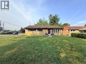 Windsor apartment for rent - A house with a lawn in front of it.