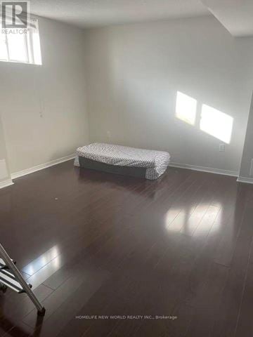 Brampton (Sandringham-Wellington) apartment for rent - A bedroom with a bed and a window.