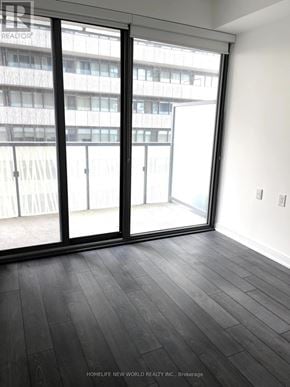 Toronto (Church-Yonge Corridor) condo for rent - A room with a sliding glass door leading to a balcony.