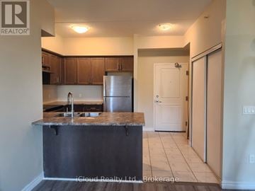 Milton (Be Beaty) condo for rent - A kitchen with a granite countertop and stainless steel appliances.