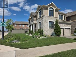 Milton (Cb Cobban) apartment for rent - A large house with a well-maintained lawn in front.