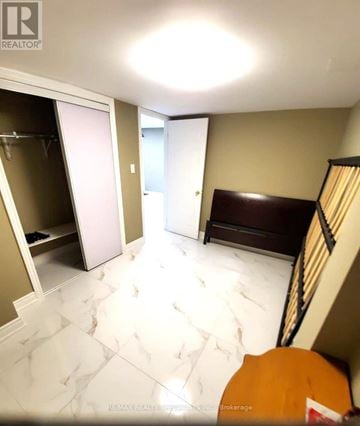 Vaughan (Vellore Village) apartment for rent - A bedroom with a bed and a closet.