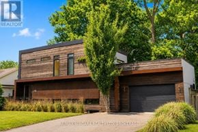 St. Catharines (Lakeport) apartment for rent - A modern house with a large garage is for sale.