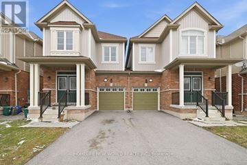 Niagara Falls (Lyons Creek) apartment for rent - A large, two-story house with a garage is for sale.