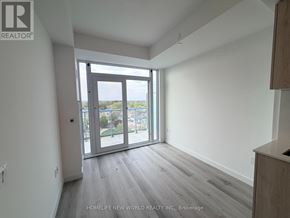 Toronto (Centennial Scarborough) condo for rent - A room with a sliding glass door leading to a balcony.