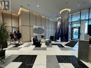 Toronto (North St. James Town) condo for rent - A lobby with a black and white checkered floor.
