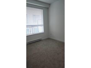 Surrey apartment for rent - A room with a carpeted floor and a window with blinds.