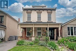 Hamilton (Central) apartment for rent - A house with a well-maintained front yard.