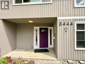 North Vancouver apartment for rent - A house numbered 3444 with a purple door.