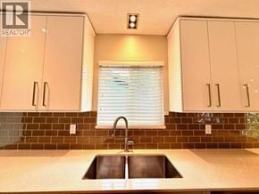 North Vancouver apartment for rent - A kitchen with a sink and cabinets.