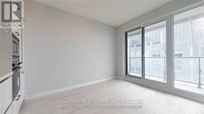 Toronto (Mount Pleasant West) condo for rent - A white room with a window and a sign that says Baytree Real Estate Inc.