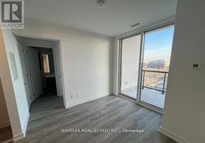 Toronto (Downsview-Roding-Cfb) condo for rent - A realtor photo of a room with a sliding glass door.