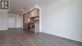 Vaughan (Vaughan Corporate Centre) condo for rent - A spacious room with a kitchen island in the middle.