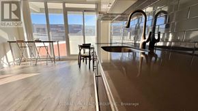 Markham (Unionville) condo for rent - A kitchen with a sink and a window.