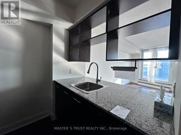 Toronto (Agincourt South-Malvern West) condo for rent - A kitchen with a sink and a window.