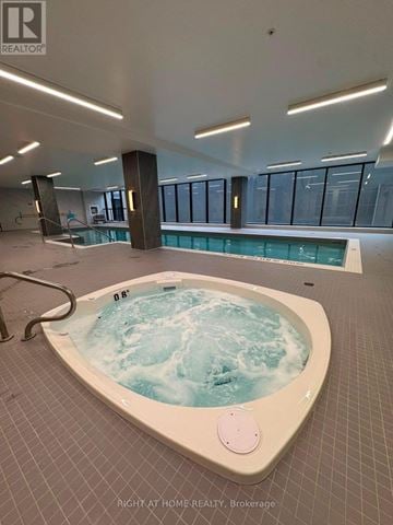 Mississauga (Clarkson) condo for rent - A hot tub in a room with a Realtor logo.