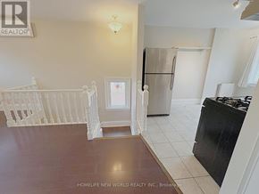 Toronto (High Park-Swansea) apartment for rent - A baby's room with a crib and a dresser.